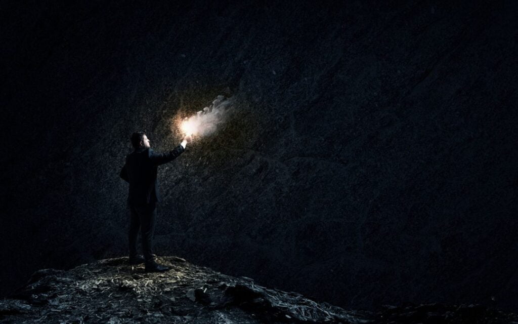 Light breaking through darkness symbolizing Hanukkah Day 3, exposure of hidden things, discernment, and God’s truth bringing freedom