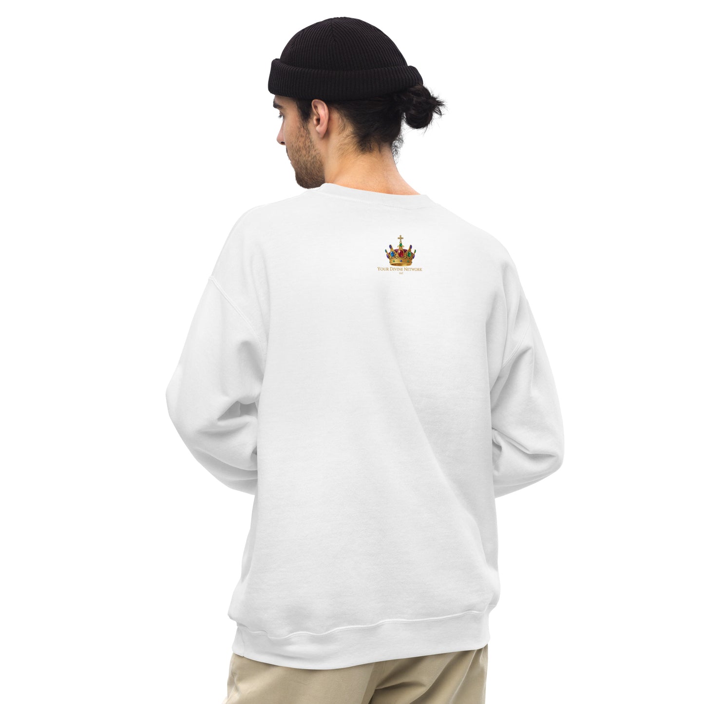 Person wearing a white long-sleeve shirt with a logo on the back, standing against a white background