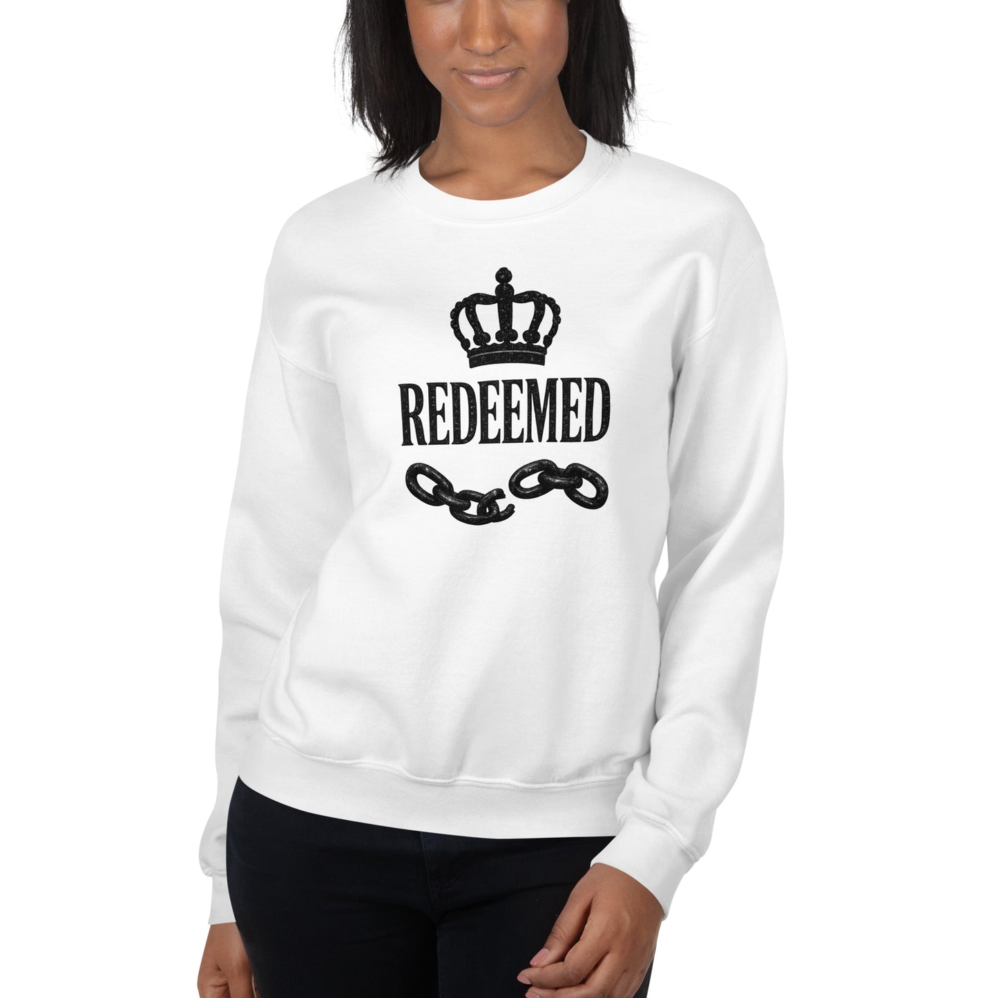 White sweatshirt with 'REDEEMED' and chain design on a white background