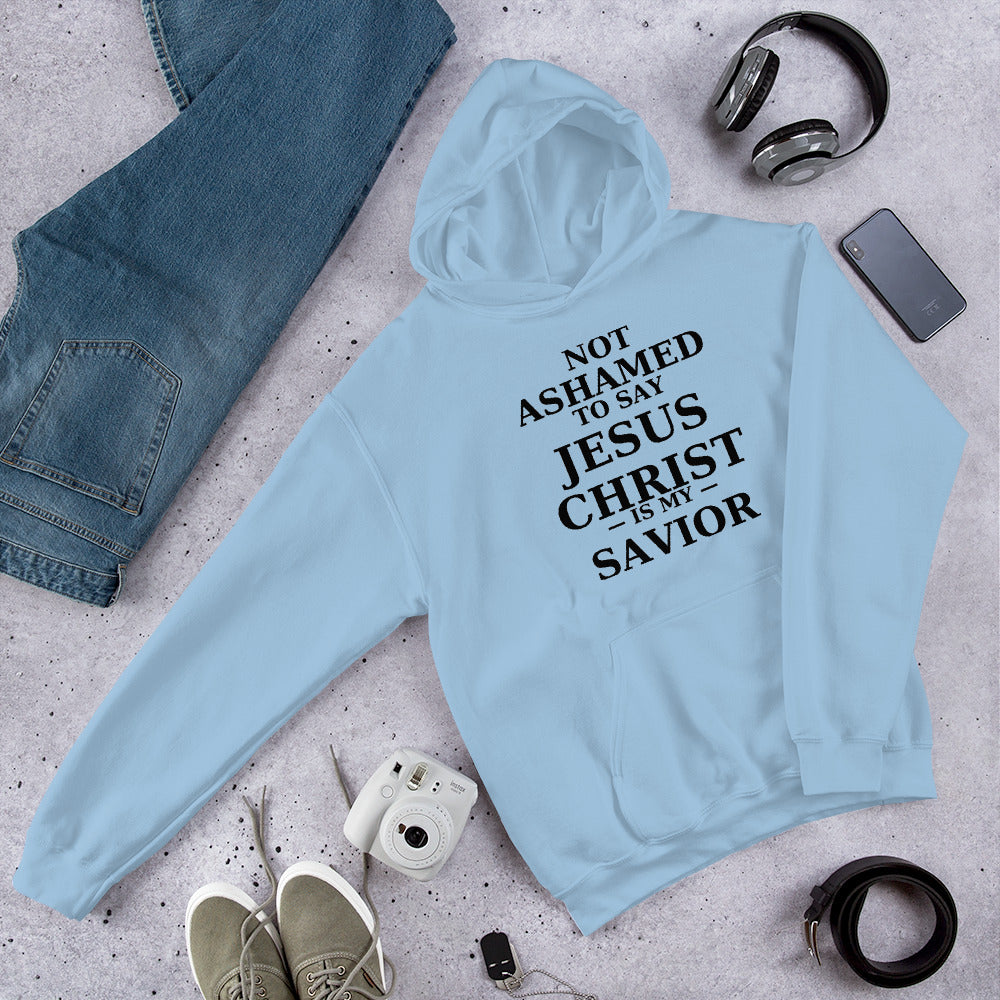 “Blue Christian hoodie with the bold faith message ‘Not Ashamed to Say Jesus Is My Savior’ in modern typography. Inspirational Scripture-based apparel for evangelism and everyday Christian streetwear.”