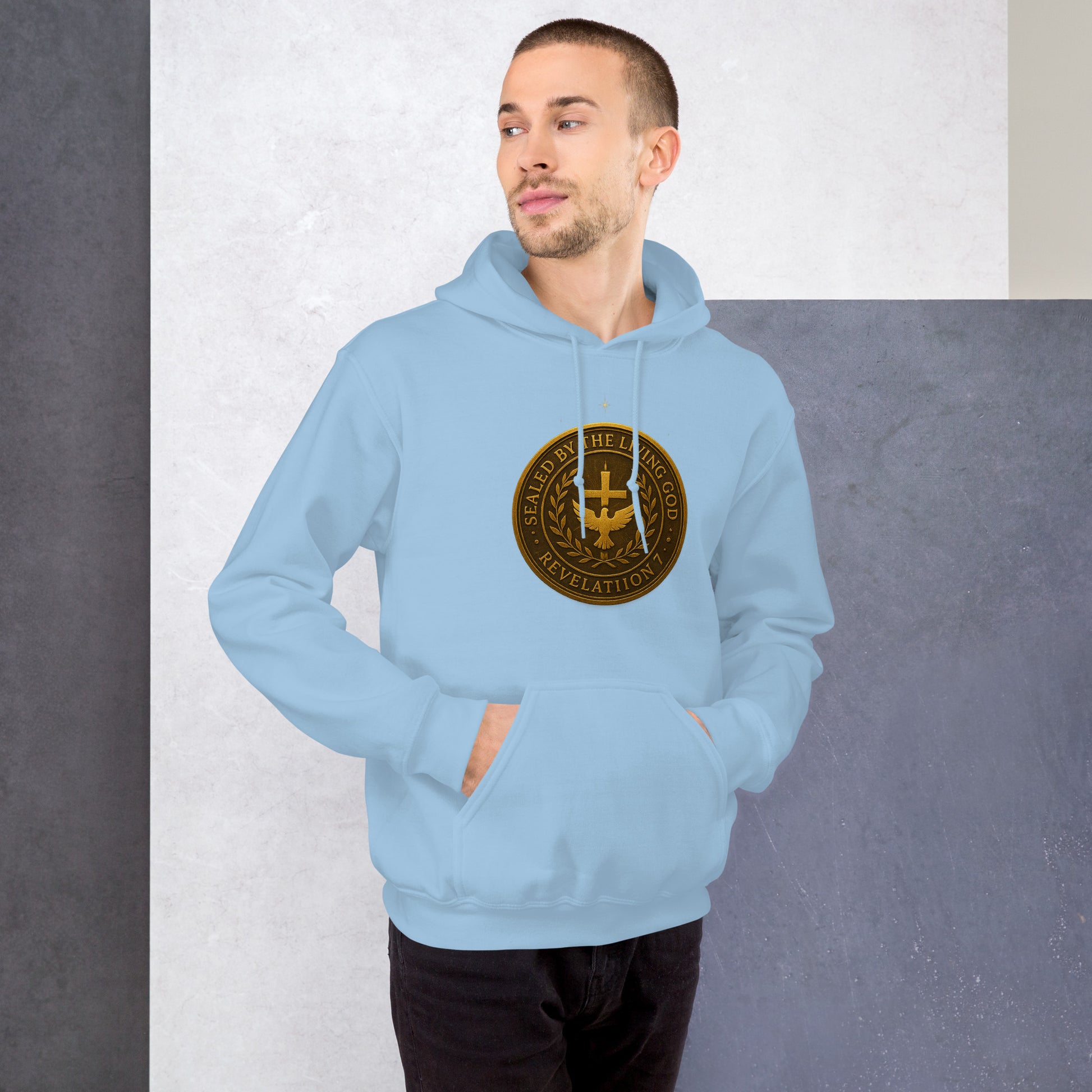 Christian hoodie with gold seal emblem that reads “Sealed by the Living God – Revelation 7” with a cross and dove in the center.
