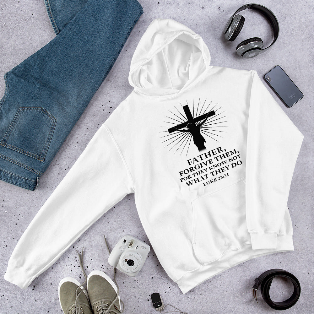 White hoodie with a cross and text design on a gray surface with jeans, phone, and shoes.