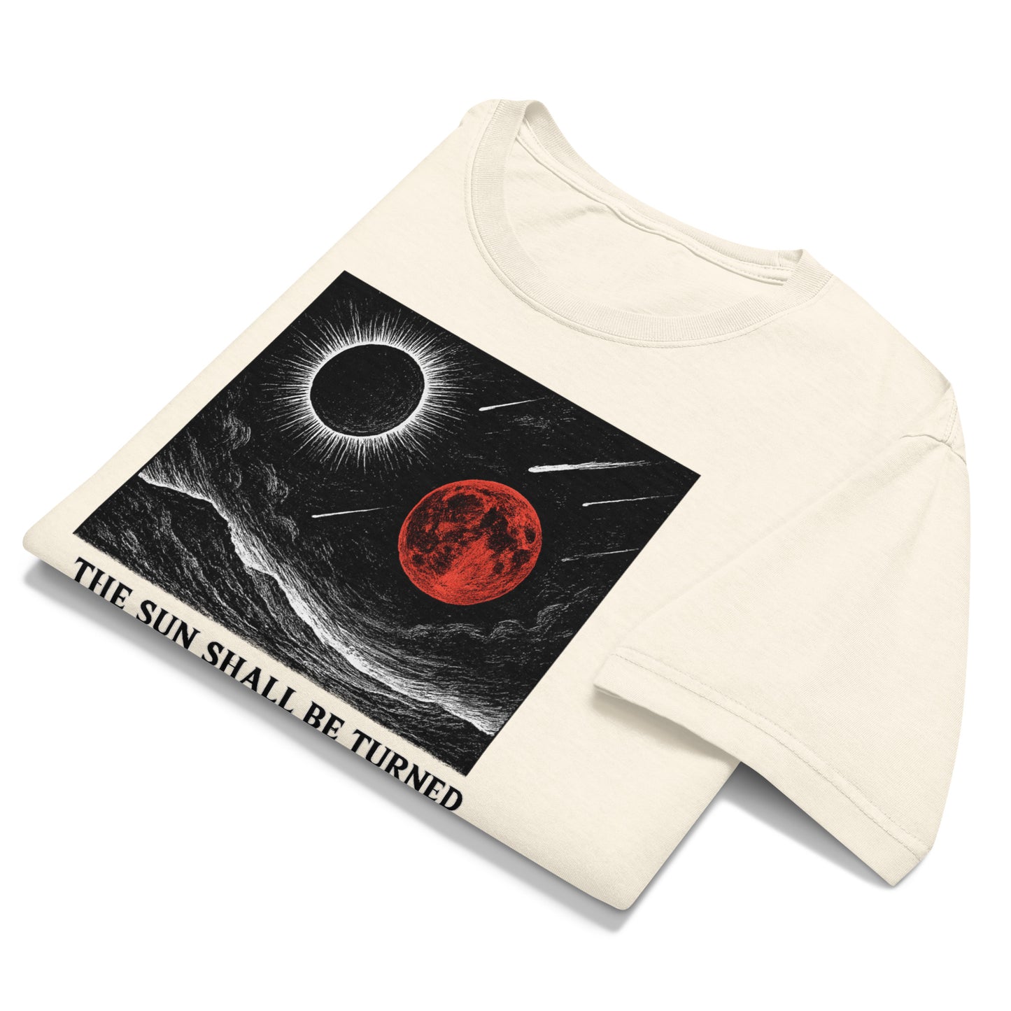 Beige t-shirt with a graphic design of a solar eclipse and red moon on a white background
