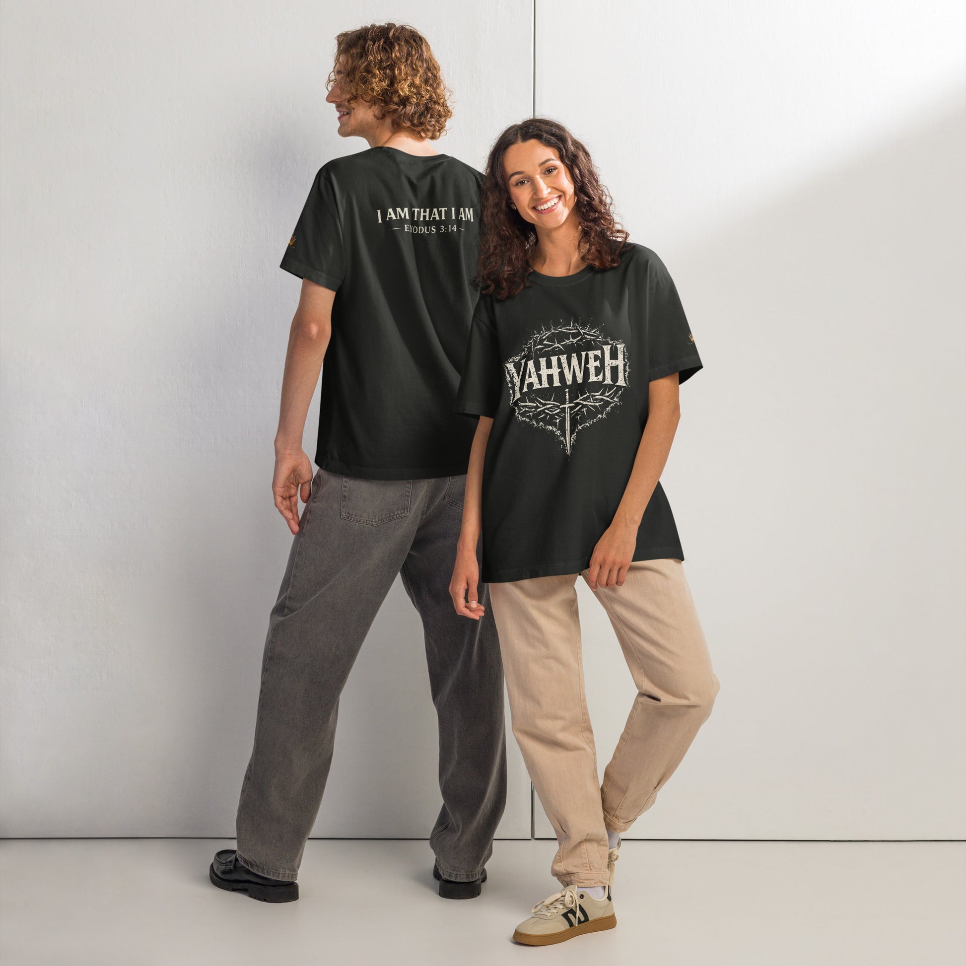 Oversized washed black Christian streetwear t-shirt featuring distressed YAHWEH typography with crown of thorns and sword design