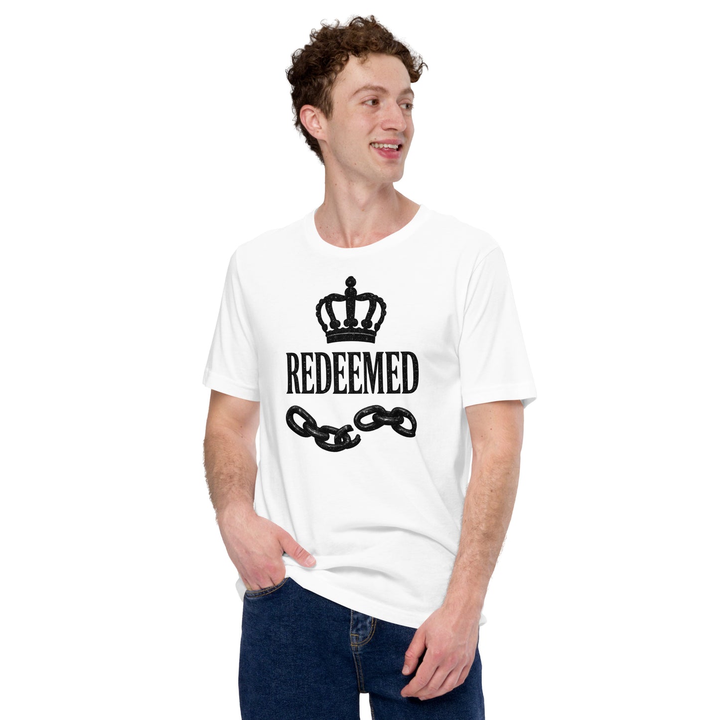 Christian t-shirt featuring a black crown, broken chains, and Redeemed typography in luxury faith streetwear style.