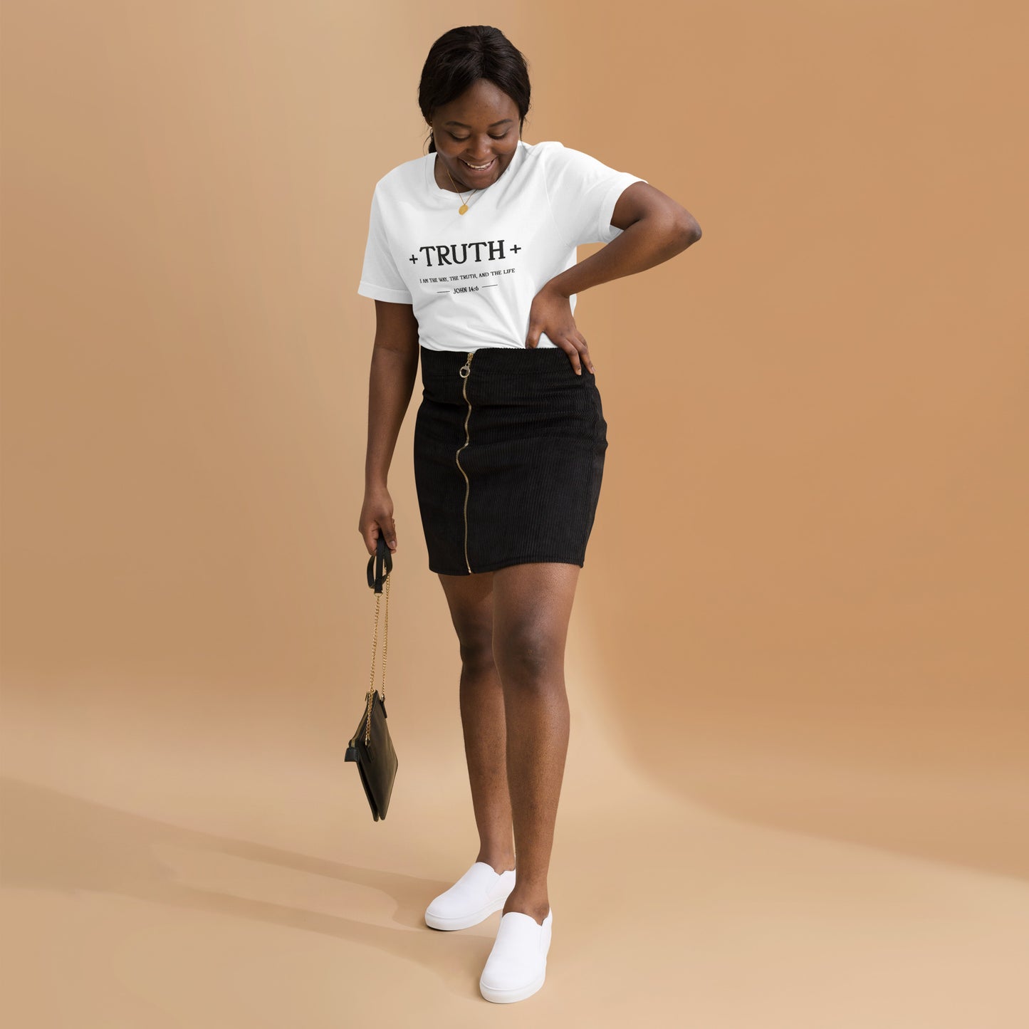 Minimalist white Bella Canvas Christian t-shirt featuring the word “Truth” in elegant black typography with subtle faith-inspired design details.