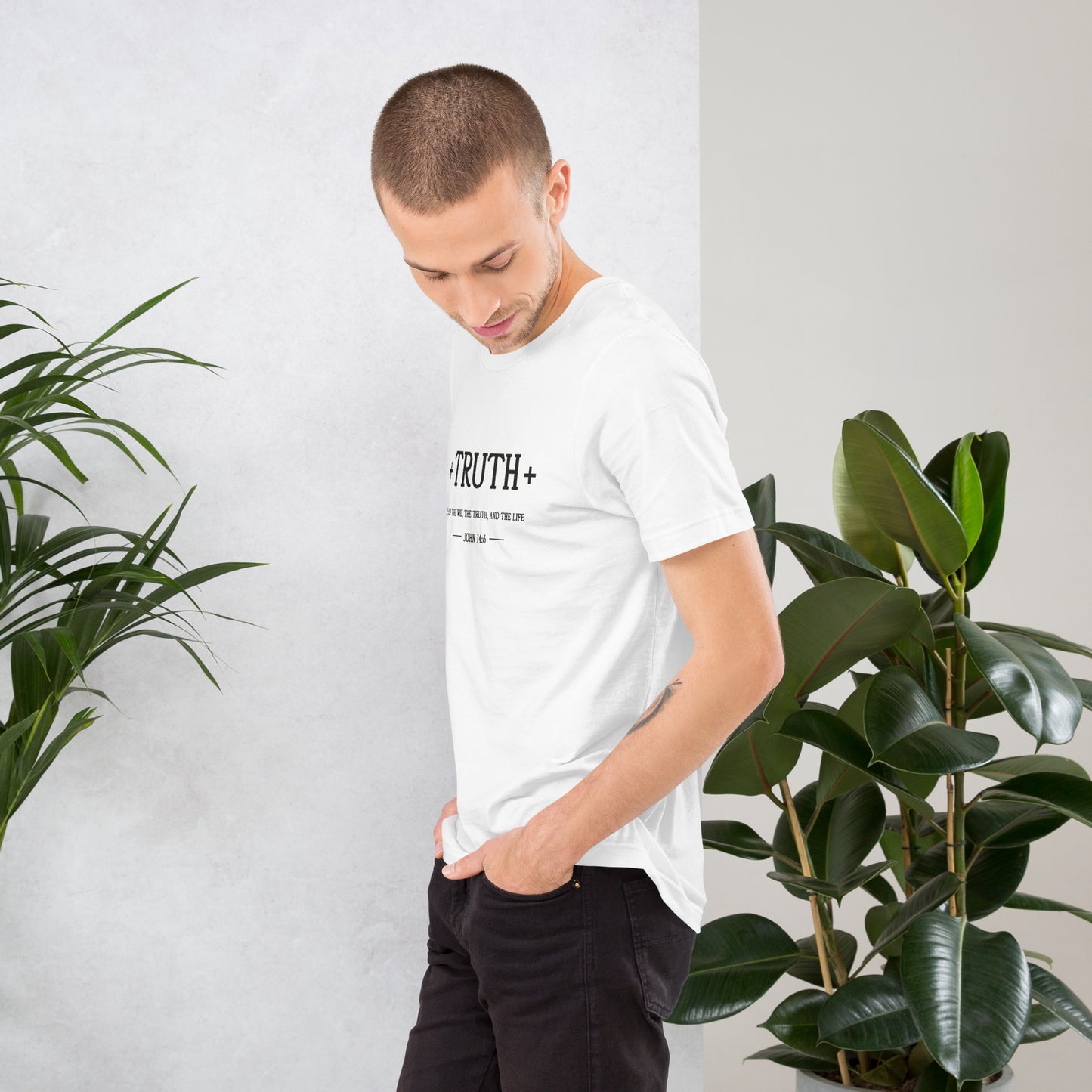 Minimalist white Bella Canvas Christian t-shirt featuring the word “Truth” in elegant black typography with subtle faith-inspired design details.