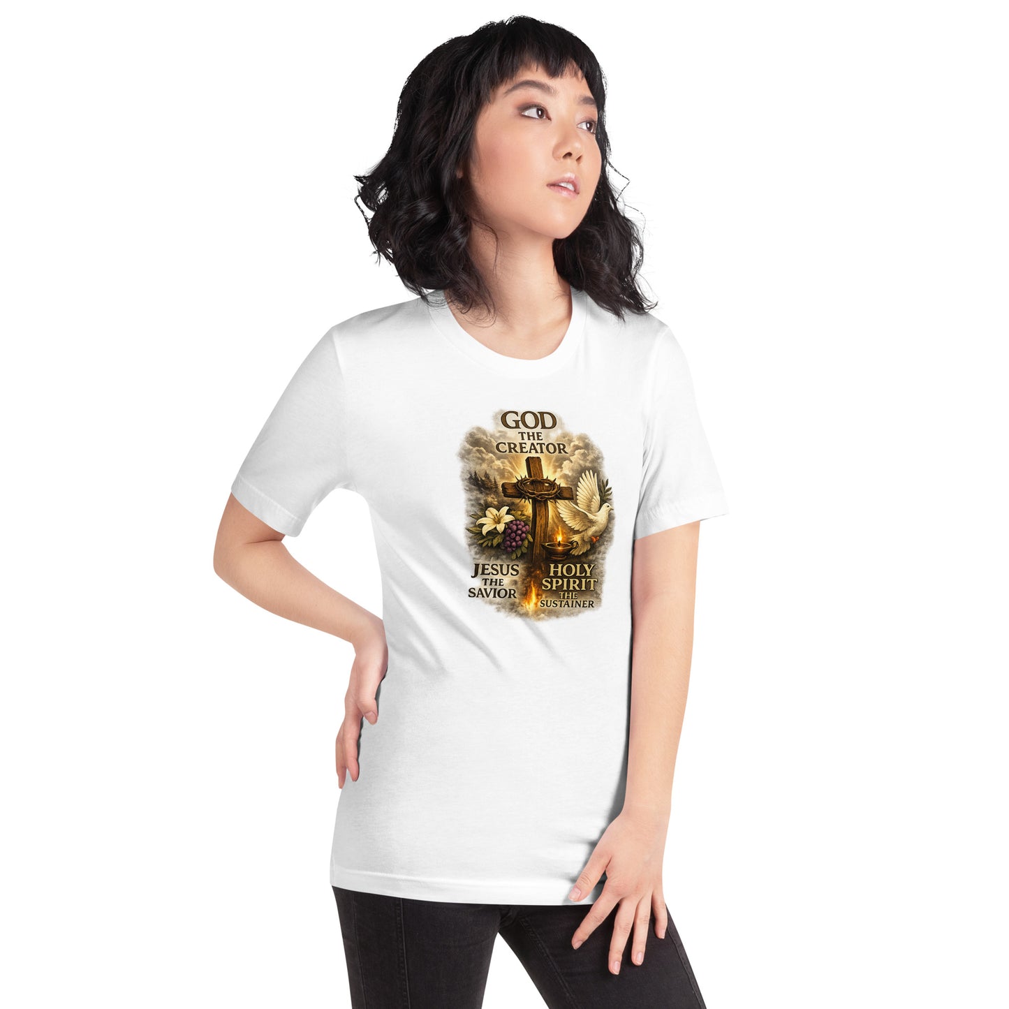 Christian white T-shirt design with the words God the Creator Jesus the Savior Holy Spirit the Sustainer featuring a wooden cross, dove, flame, grapes, and lily